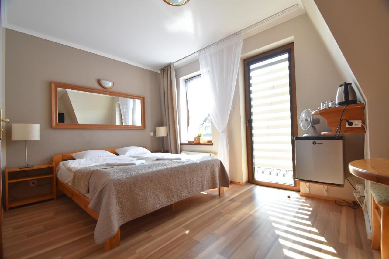 Aparthotel Mikolajki Esterno foto